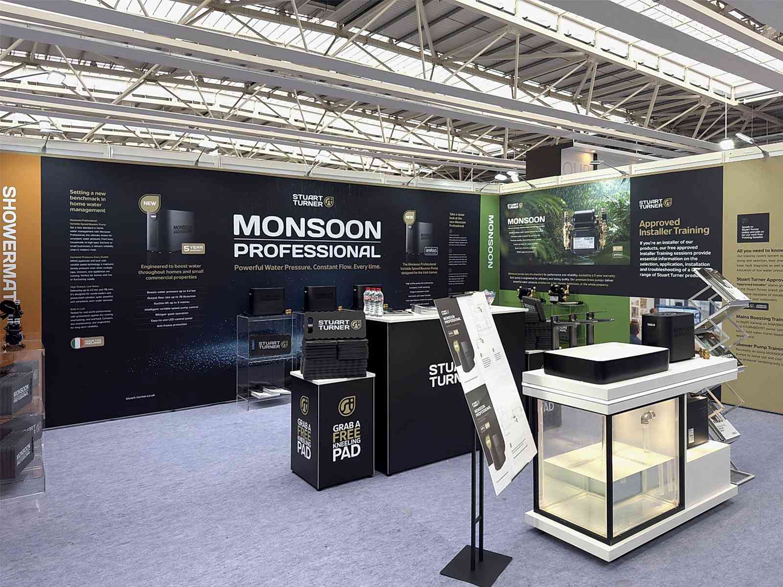 Seamless shell scheme exhibition stand upgrade with branded graphics and counters at Plumbex Dublin 2025.
